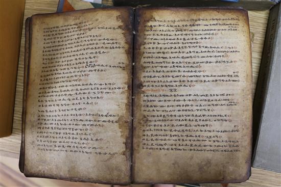 A parchment copy of The Koran and sundry bindings